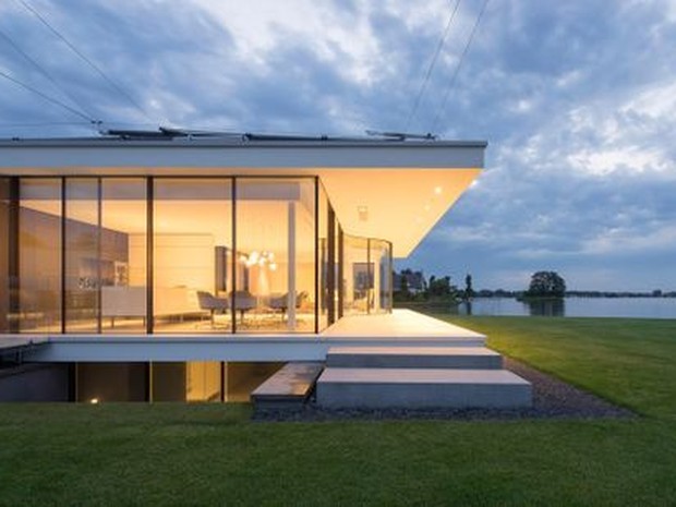 Casa con terraza acristalada